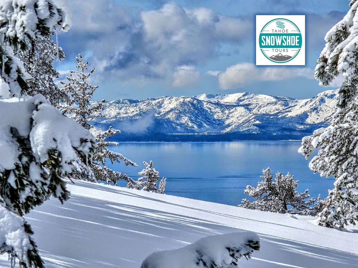 Snowshoe guide photographing guests with Lake Tahoe in the background